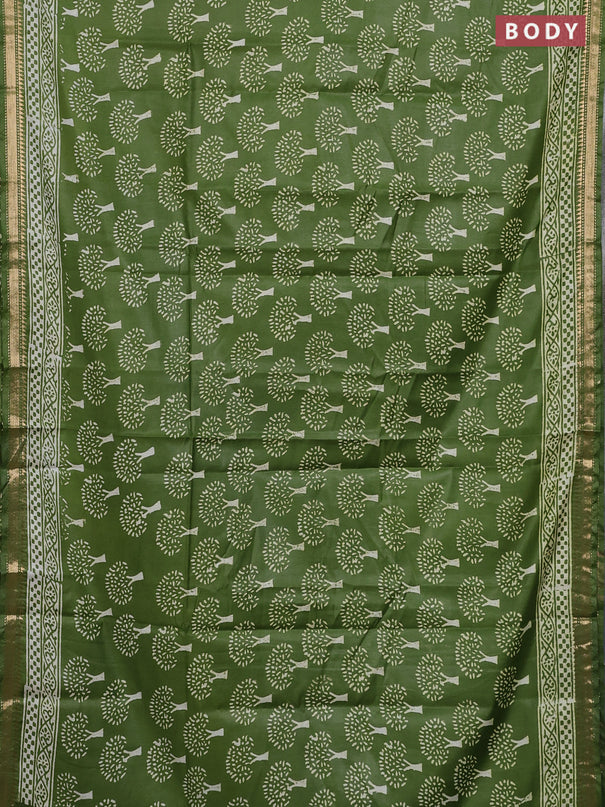 Semi bhagalpuri saree light green with allover prints and zari woven border