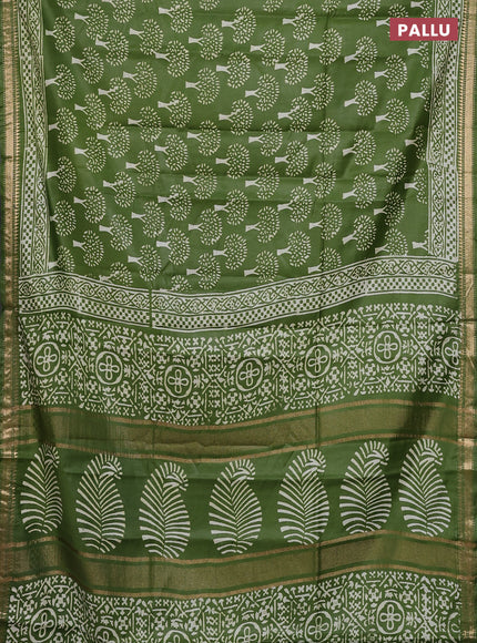 Semi bhagalpuri saree light green with allover prints and zari woven border