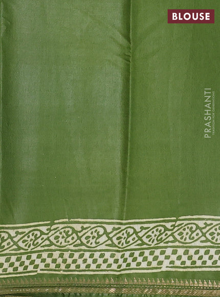 Semi bhagalpuri saree light green with allover prints and zari woven border