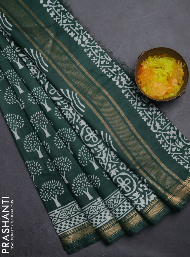Semi bhagalpuri saree green with allover prints and zari woven border