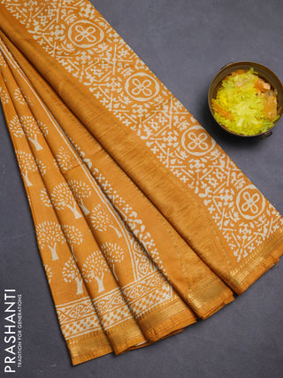 Semi bhagalpuri saree mustard yellow with allover prints and zari woven border