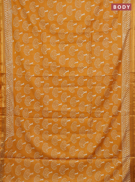 Semi bhagalpuri saree mustard yellow with allover prints and zari woven border