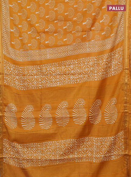 Semi bhagalpuri saree mustard yellow with allover prints and zari woven border