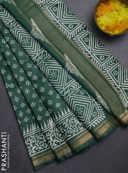 Semi bhagalpuri saree bottle green with allover prints and zari woven border
