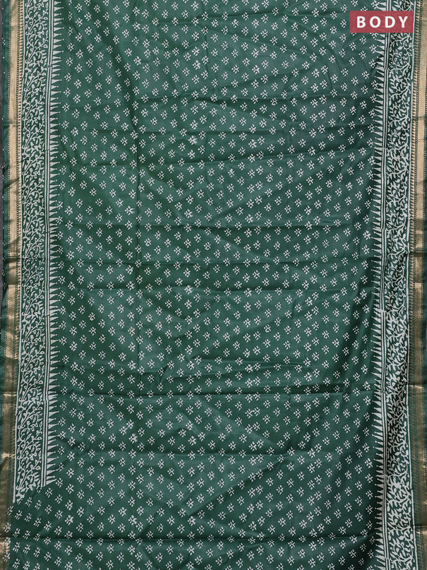 Semi bhagalpuri saree bottle green with allover prints and zari woven border