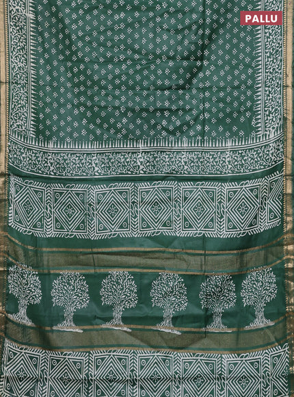 Semi bhagalpuri saree bottle green with allover prints and zari woven border