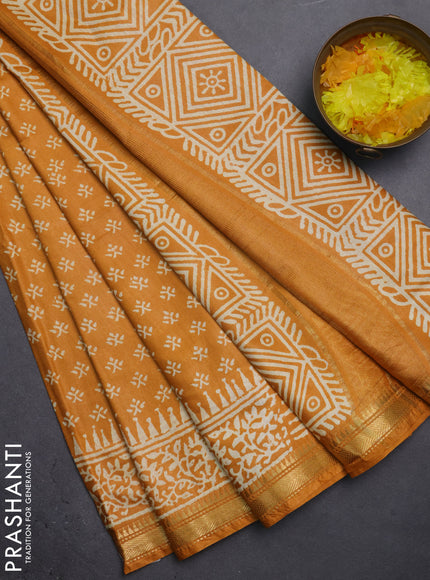 Semi bhagalpuri saree mustard yellow with allover prints and zari woven border