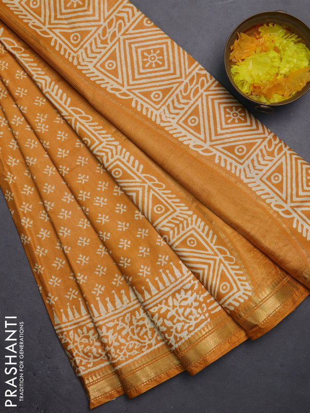 Semi bhagalpuri saree mustard yellow with allover prints and zari woven border