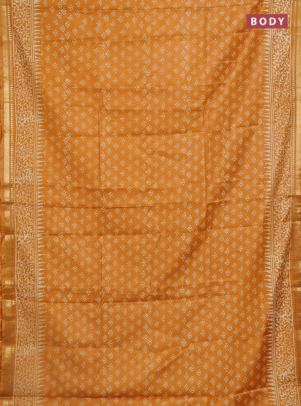Semi bhagalpuri saree mustard yellow with allover prints and zari woven border