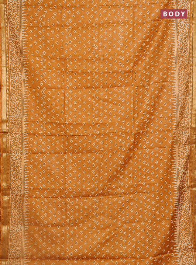 Semi bhagalpuri saree mustard yellow with allover prints and zari woven border