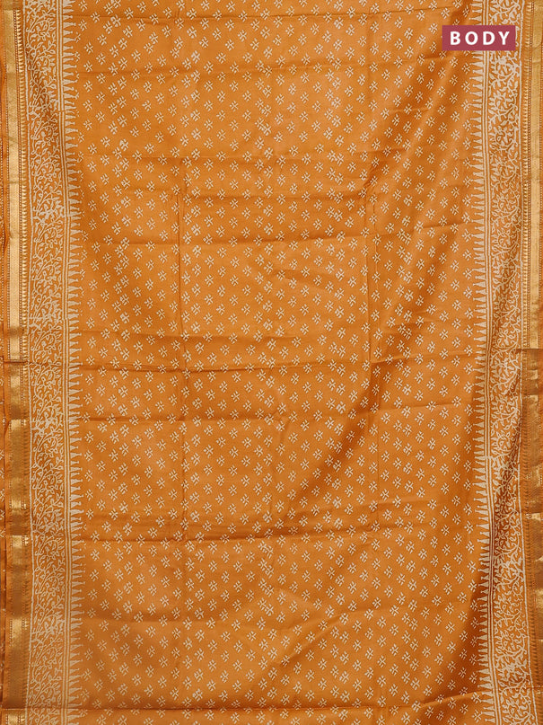 Semi bhagalpuri saree mustard yellow with allover prints and zari woven border