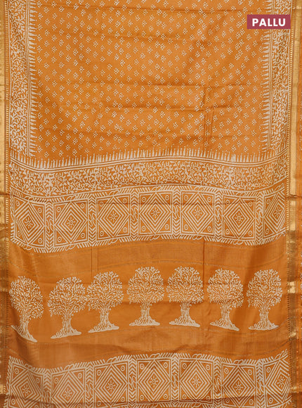 Semi bhagalpuri saree mustard yellow with allover prints and zari woven border