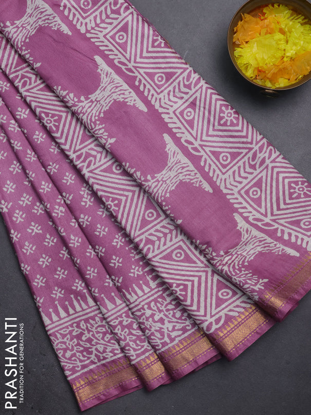 Semi bhagalpuri saree purple with allover prints and zari woven border