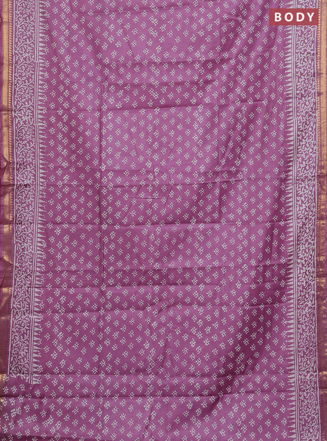 Semi bhagalpuri saree purple with allover prints and zari woven border