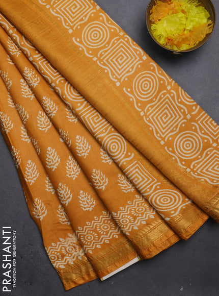 Semi bhagalpuri saree mustard yellow with allover prints and zari woven border
