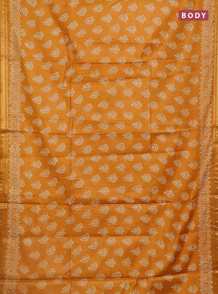 Semi bhagalpuri saree mustard yellow with allover prints and zari woven border