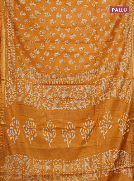Semi bhagalpuri saree mustard yellow with allover prints and zari woven border