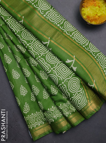 Semi bhagalpuri saree leaf green with allover prints and zari woven border