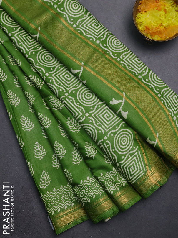 Semi bhagalpuri saree leaf green with allover prints and zari woven border