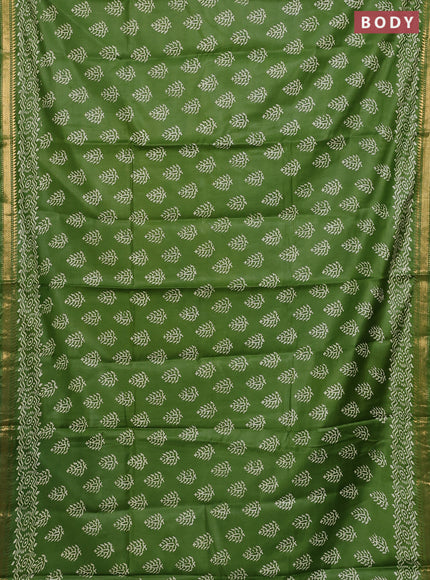 Semi bhagalpuri saree leaf green with allover prints and zari woven border
