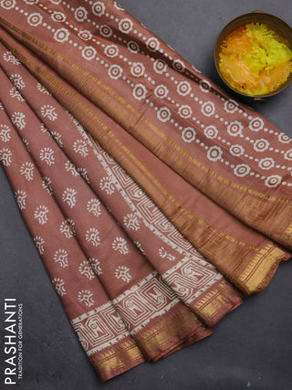 Semi bhagalpuri saree brown with allover prints and zari woven border