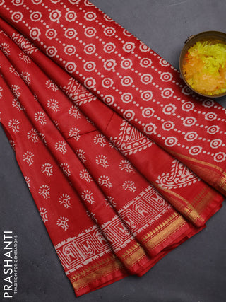 Semi bhagalpuri saree rust with allover prints and zari woven border