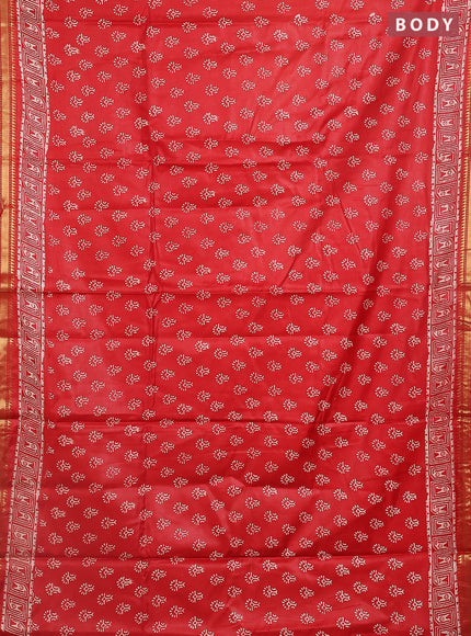 Semi bhagalpuri saree rust with allover prints and zari woven border