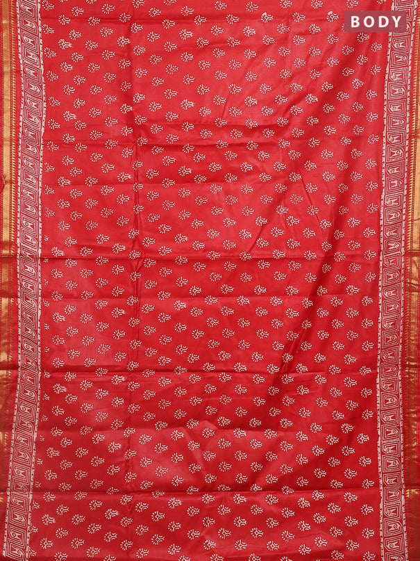 Semi bhagalpuri saree rust with allover prints and zari woven border