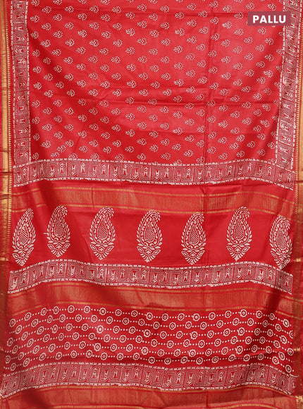 Semi bhagalpuri saree rust with allover prints and zari woven border