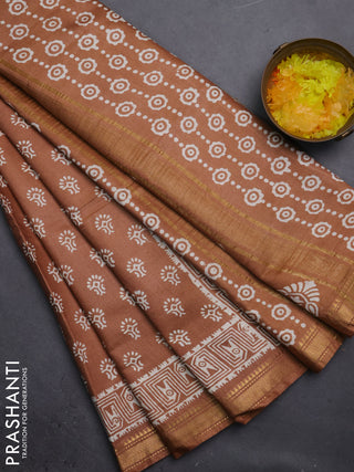 Semi bhagalpuri saree sandal with allover prints and zari woven border