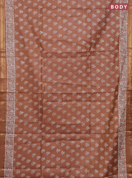 Semi bhagalpuri saree sandal with allover prints and zari woven border
