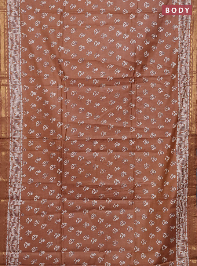 Semi bhagalpuri saree sandal with allover prints and zari woven border