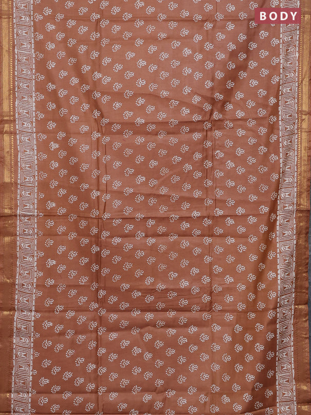 Semi bhagalpuri saree sandal with allover prints and zari woven border