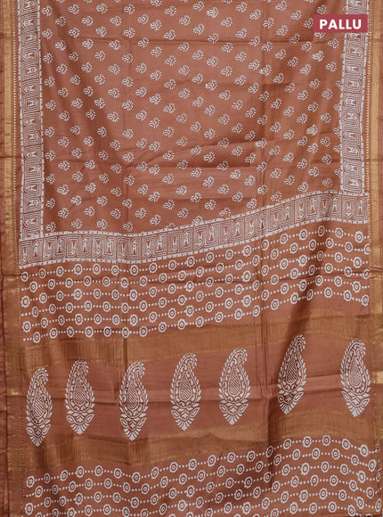 Semi bhagalpuri saree sandal with allover prints and zari woven border