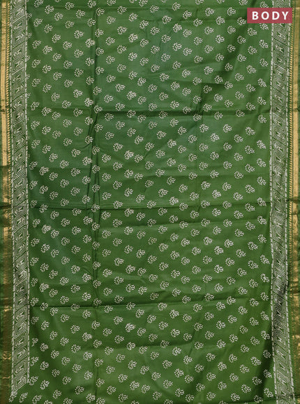 Semi bhagalpuri saree light green with allover prints and zari woven border