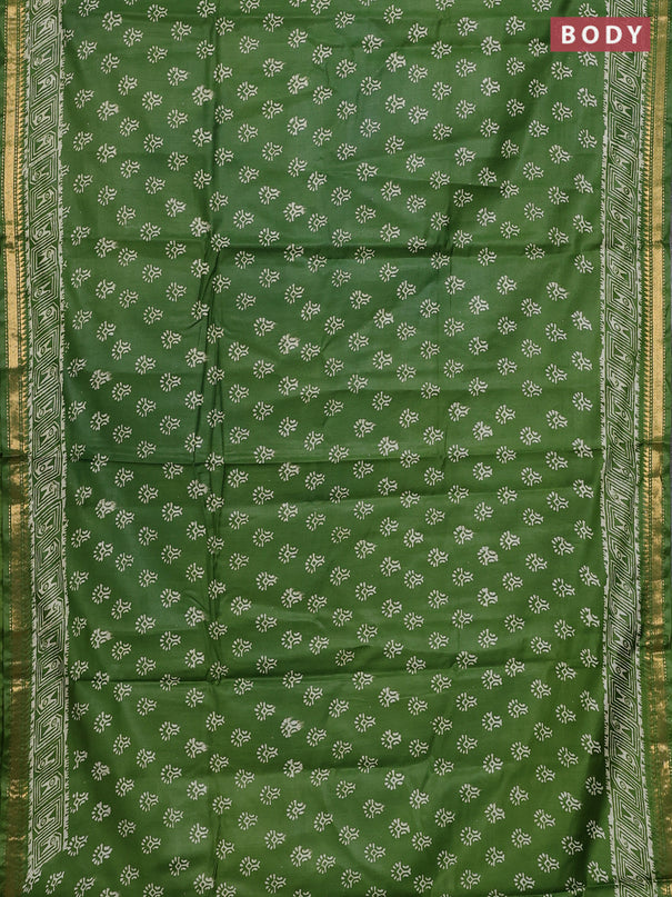 Semi bhagalpuri saree light green with allover prints and zari woven border