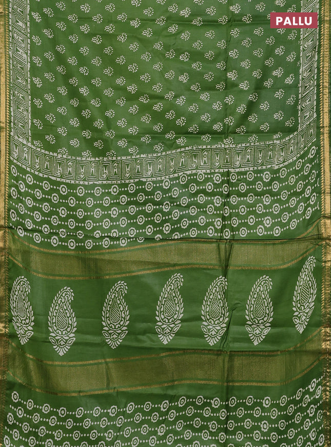 Semi bhagalpuri saree light green with allover prints and zari woven border