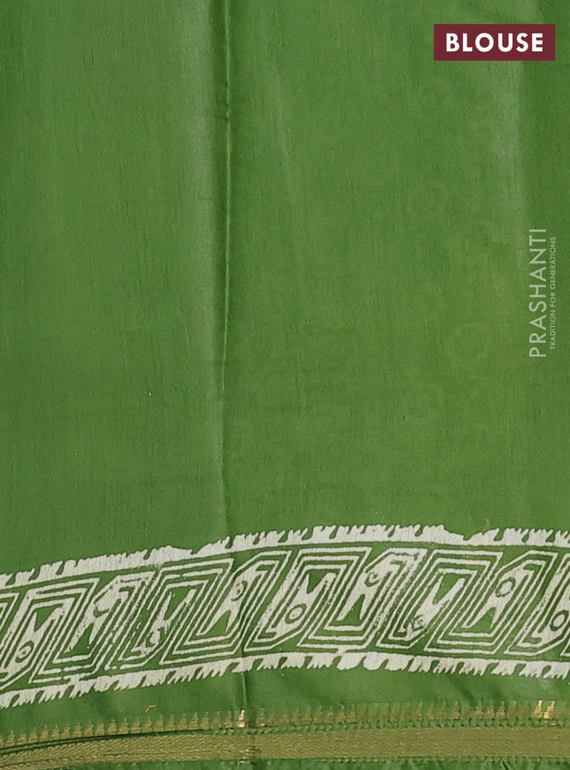 Semi bhagalpuri saree light green with allover prints and zari woven border