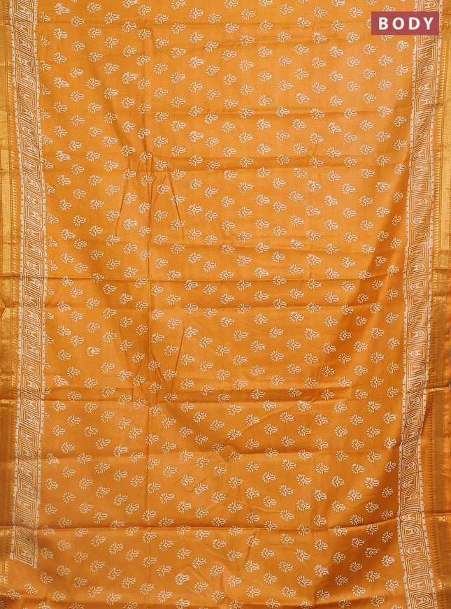 Semi bhagalpuri saree mustard yellow with allover prints and zari woven border