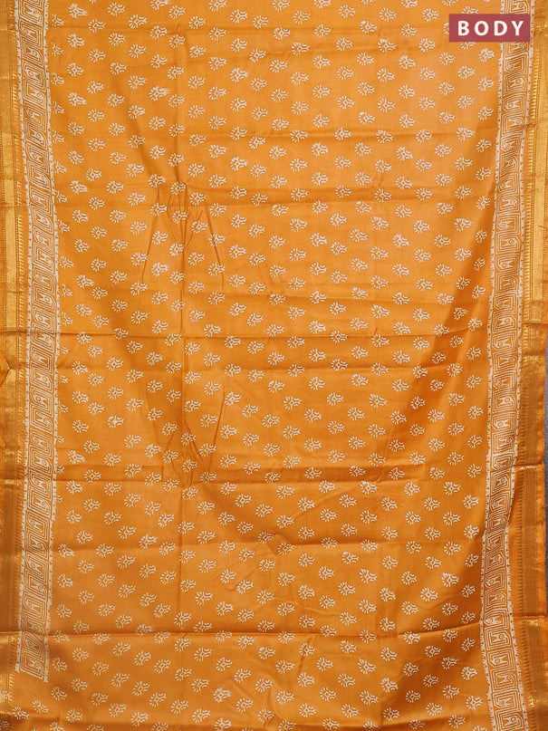 Semi bhagalpuri saree mustard yellow with allover prints and zari woven border