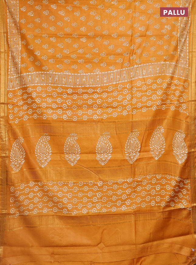 Semi bhagalpuri saree mustard yellow with allover prints and zari woven border
