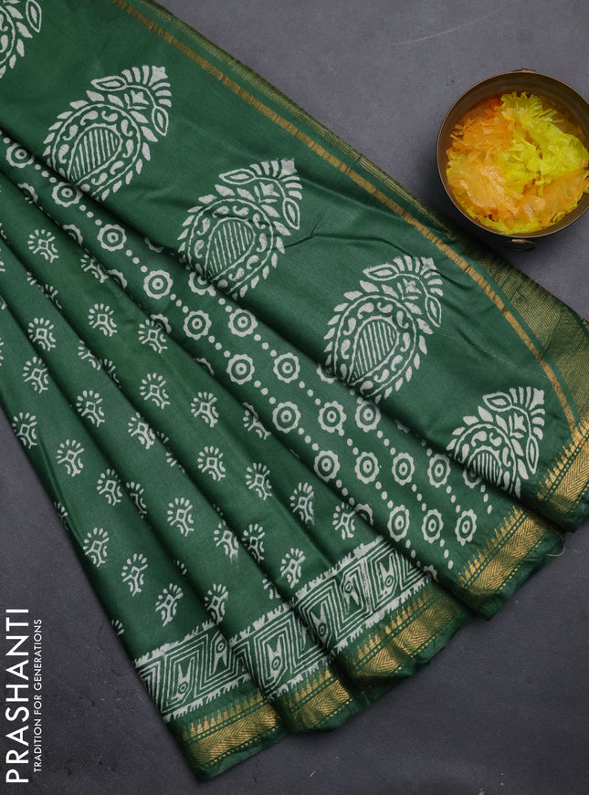 Semi bhagalpuri saree bottle green with allover prints and zari woven border