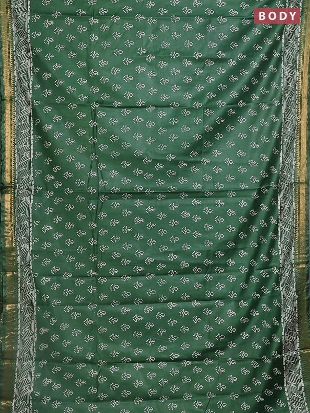 Semi bhagalpuri saree bottle green with allover prints and zari woven border