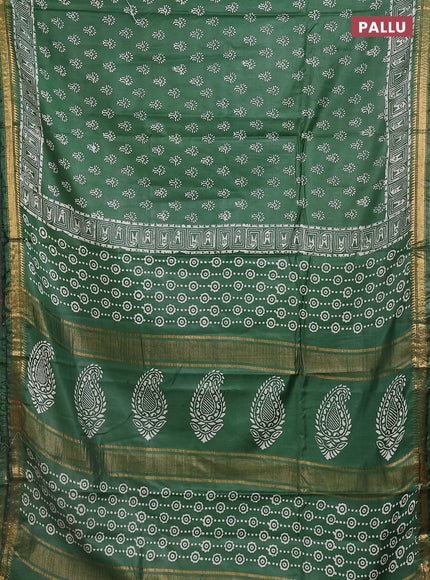 Semi bhagalpuri saree bottle green with allover prints and zari woven border