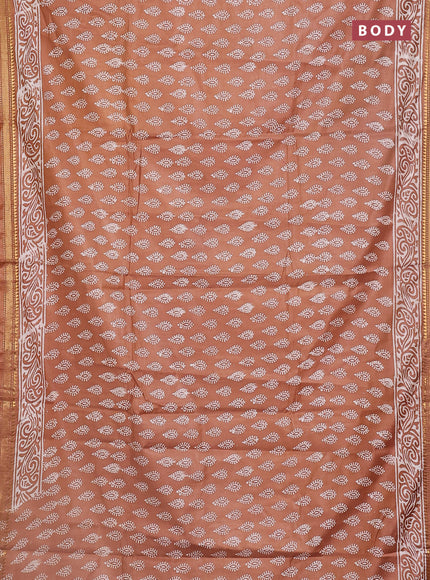 Semi bhagalpuri saree sandal with allover prints and zari woven border