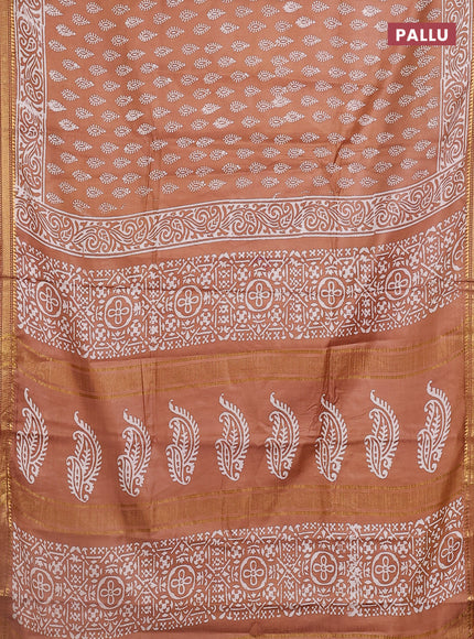 Semi bhagalpuri saree sandal with allover prints and zari woven border