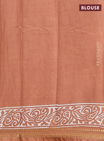 Semi bhagalpuri saree sandal with allover prints and zari woven border