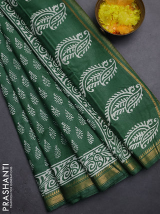 Semi bhagalpuri saree bottle green with allover prints and zari woven border