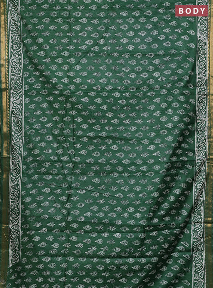 Semi bhagalpuri saree bottle green with allover prints and zari woven border