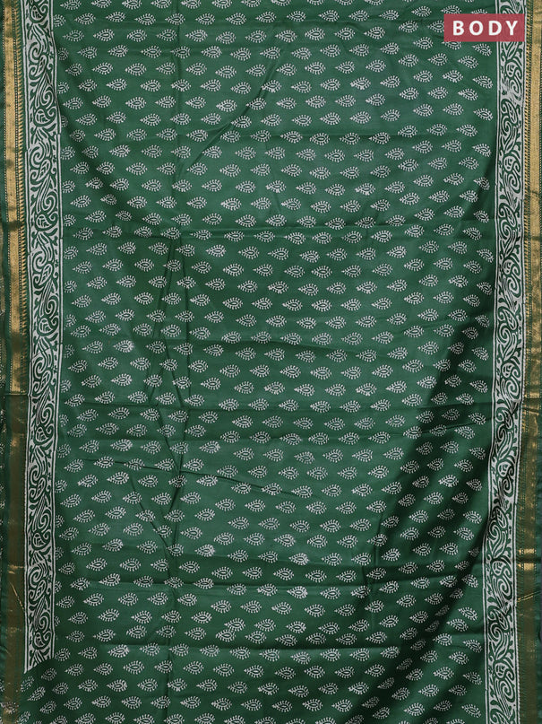 Semi bhagalpuri saree bottle green with allover prints and zari woven border